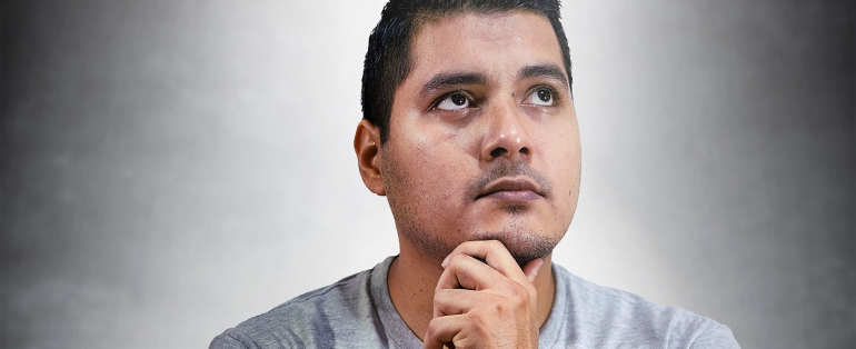a man thinking about how to pack your items the Tetris way