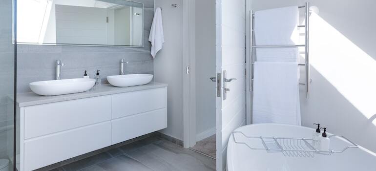 keeping the bathroom clean according to our ultimate move out cleaning checklist