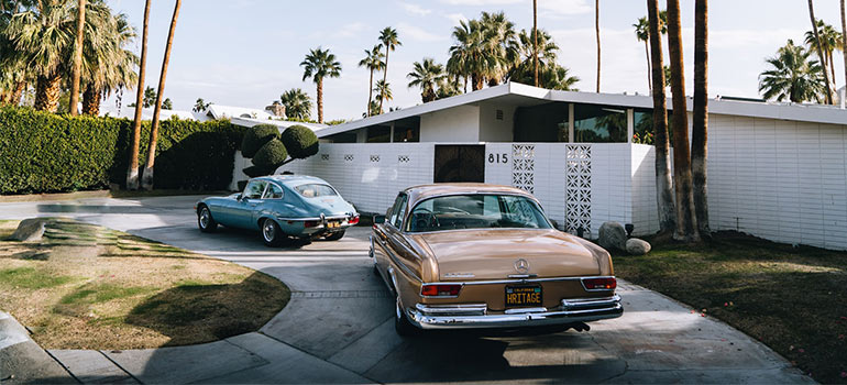 cars in front of a house