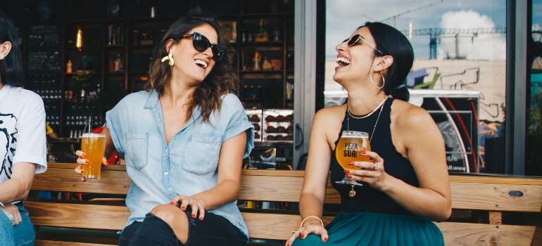 two female influencers in a cafe