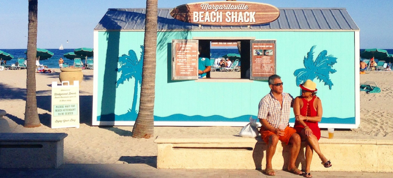 people on a beach in one of the coolest places in Florida