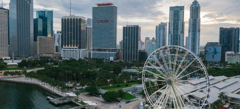 Aerial view on Miami with buildings and Ferris wheel