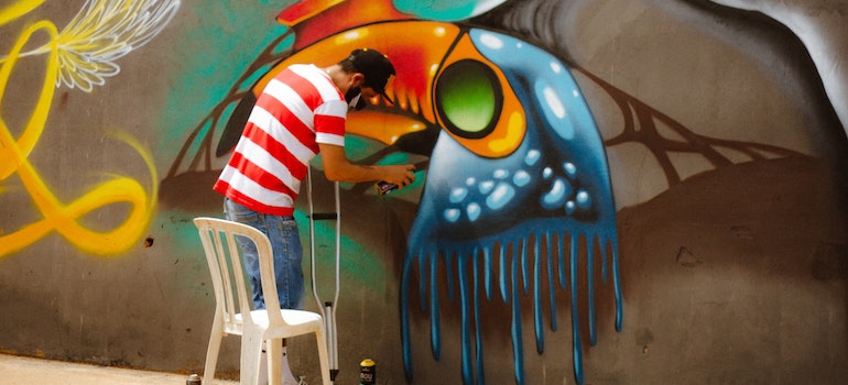 a man doing graffiti in one of the best Florida cities for visiting cultural attractions