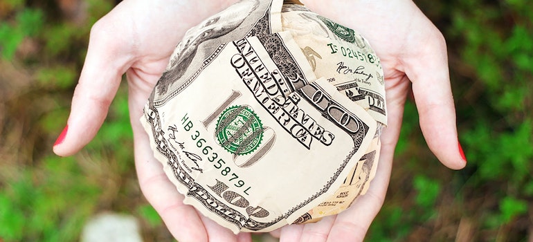 Woman holding money