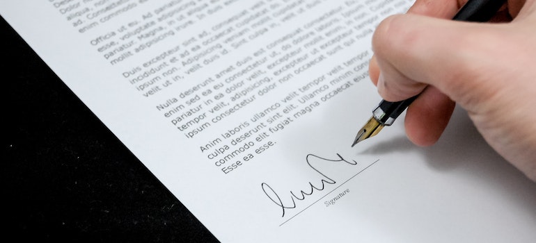Person signing a contract