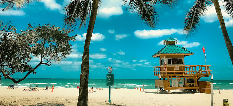 enjoying Sunny Isles Beach beach as one of the best cheap or free things to do in Florida