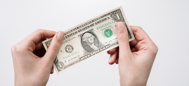 Woman holding money