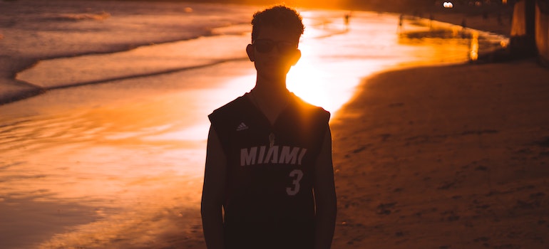a man standing in the sunset thinking about is relocation to Florida suburbs right for you
