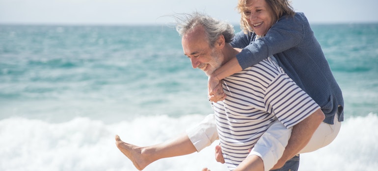 elderly couple on the beach