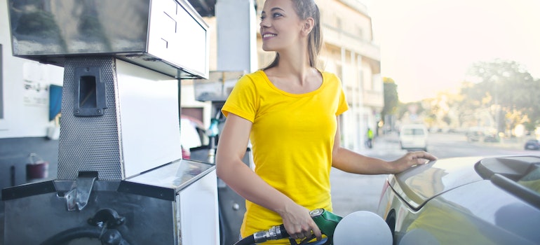girl pouring fuel
