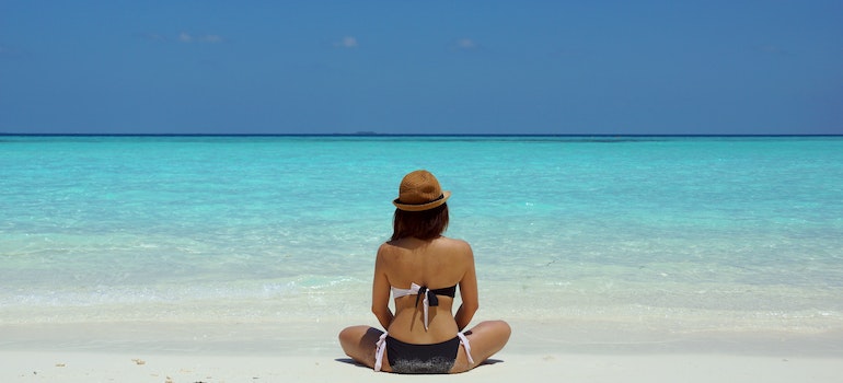 woman on the beach after moving to Florida in 2023