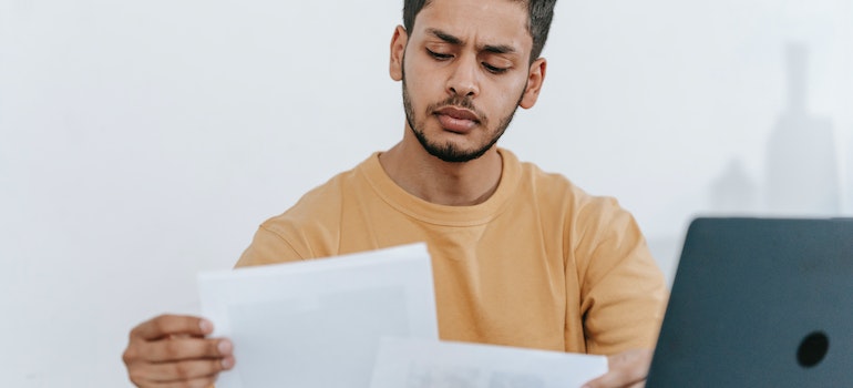 a man reading papers
