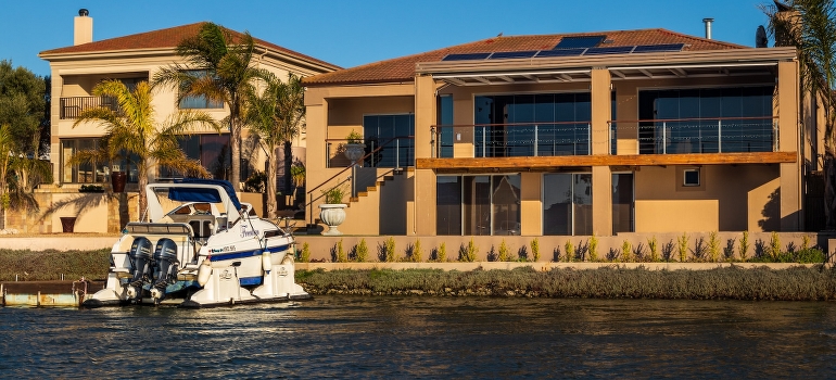 looking at a house while exploring South Florida real estate market