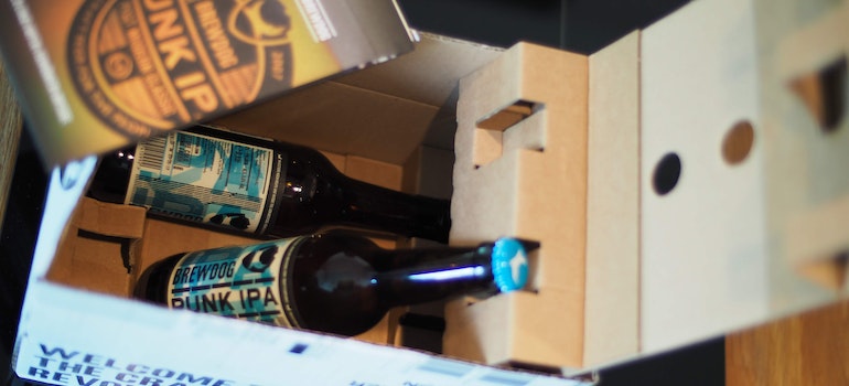 wine moving boxes waiting for Miami movers