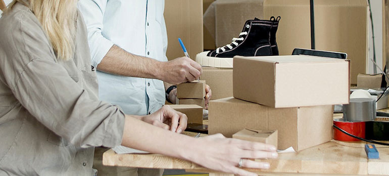 packing mini moving boxes in Miami