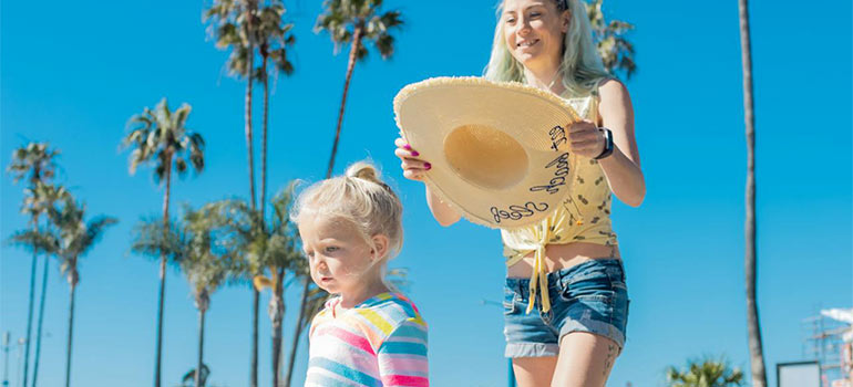 walking with a kid and thinking about Hallandale Beach vs. Miami Beach
