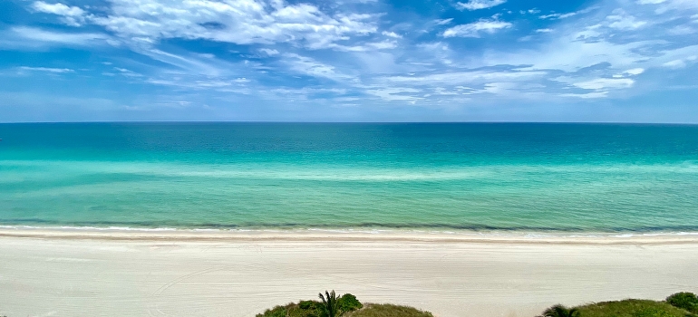 enjoying sun after moving to Sunny Isles Beach