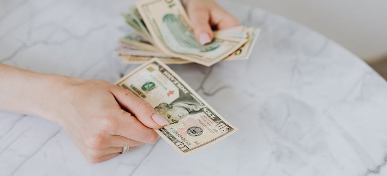 counting money after a move to Miami