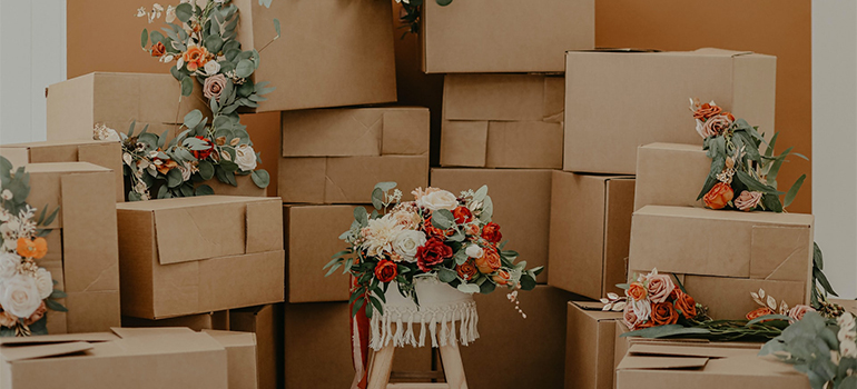 gathering boxes prior to Miami movers and packers arrival