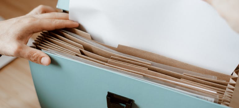 trying to prep your move with your baby by packing documents