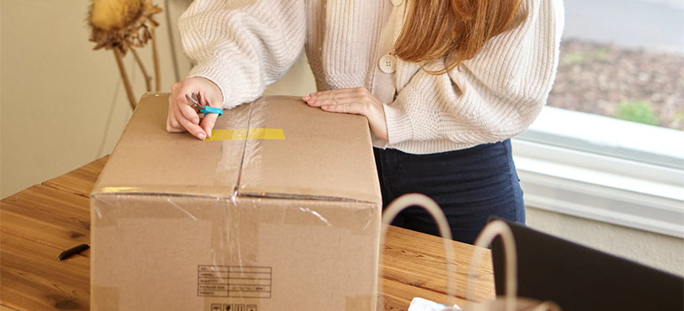 trying to prep your move with your baby by packing essentials box