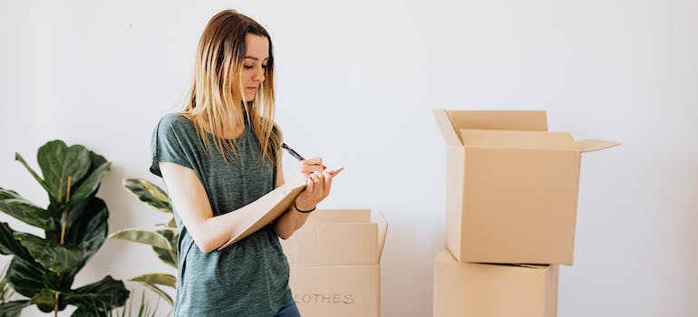 trying to prep your move with your baby by packing boxes early