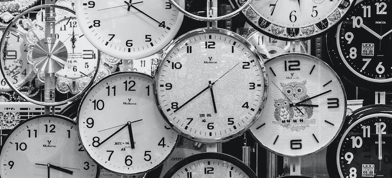 looking at clocks while thinking about selling or moving your belongings
