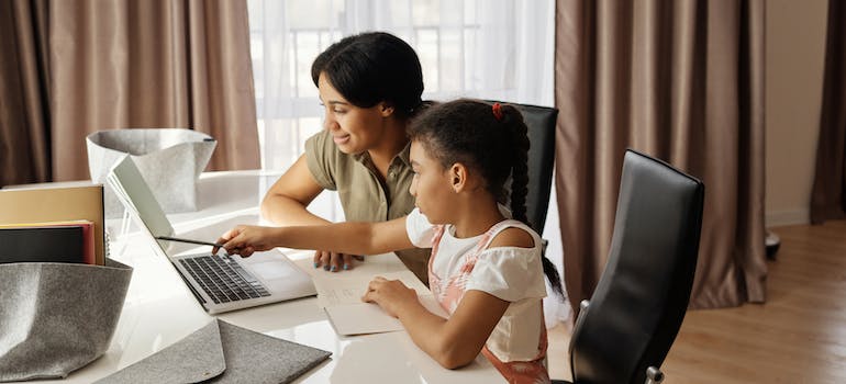 mom and kid on a laptop