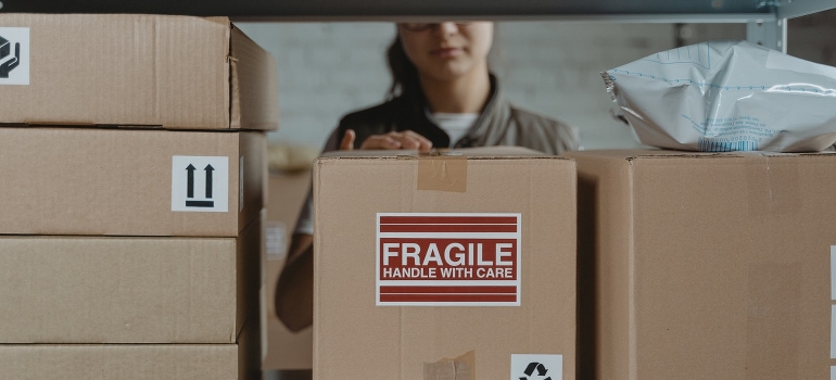 putting a box on a shelf