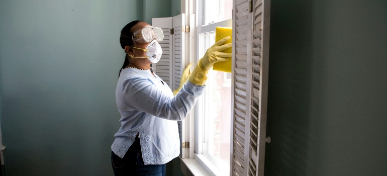 woman cleaning windows
