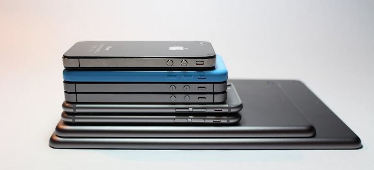 a pile of mobile phones