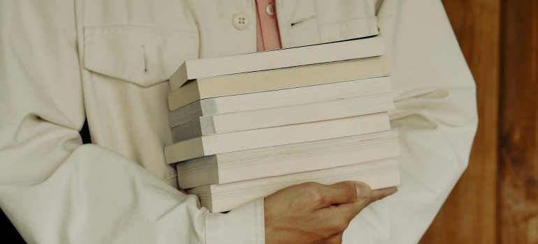 carrying books like trying to pack them like a pro