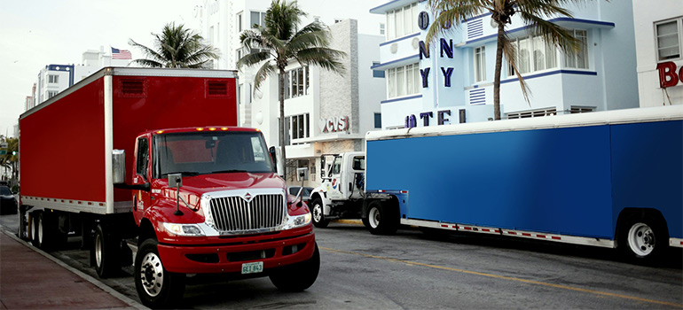 trucks handling the logistics of furnishing a home in Florida