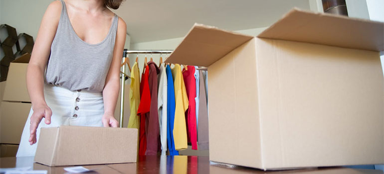 woman packing boxes