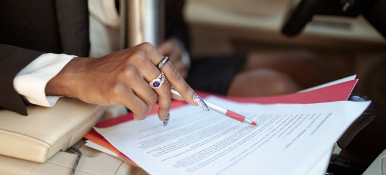 reading papers in a car