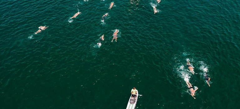 professional swimmers swimming after moving to Miami