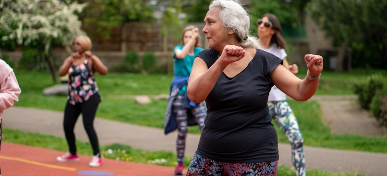 elderly women doing yoga