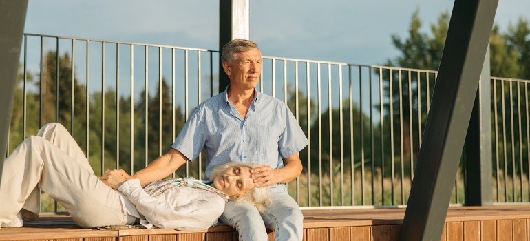 elderly couple enjoying the sun