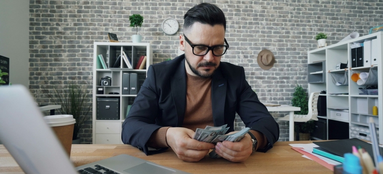 a man counting money