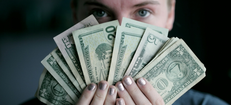 man holding cash