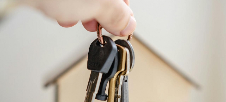 holding home keys